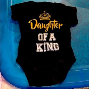 “Daughter of a King” onesie